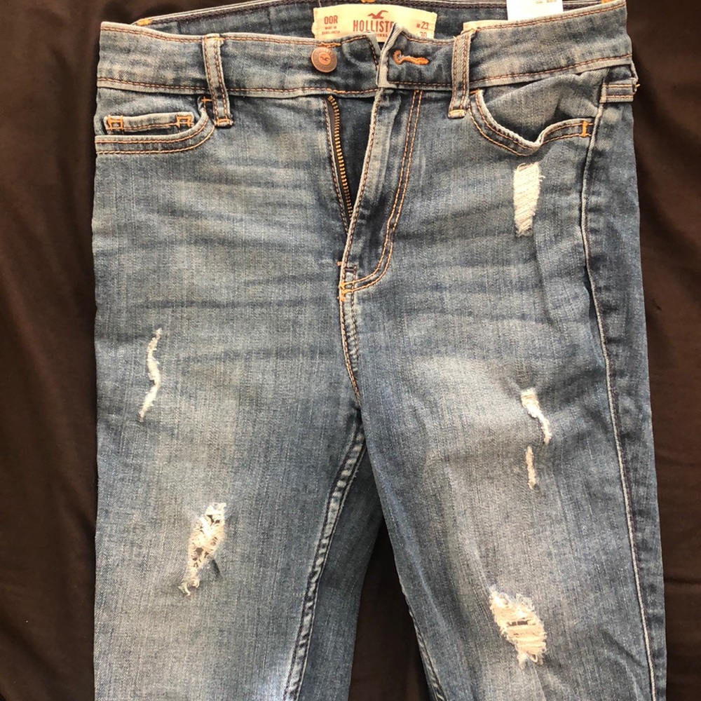 Dark blue ripped Hollister skinny jeans